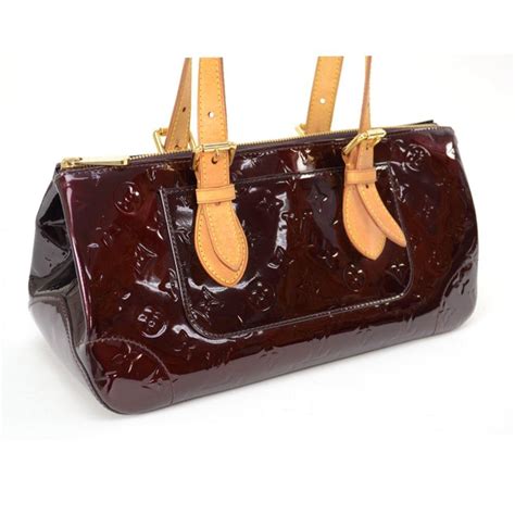 are louis vuitton bags real leather|louis vuitton shiny leather bag.